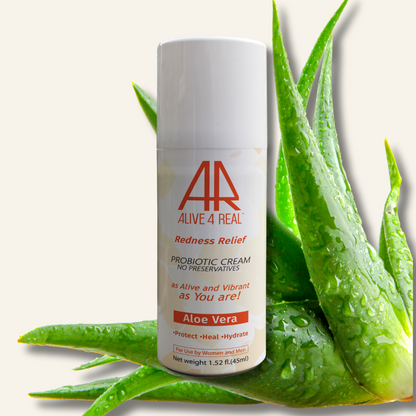 Probiotic cream bottle with aloe vera leaves on a white background