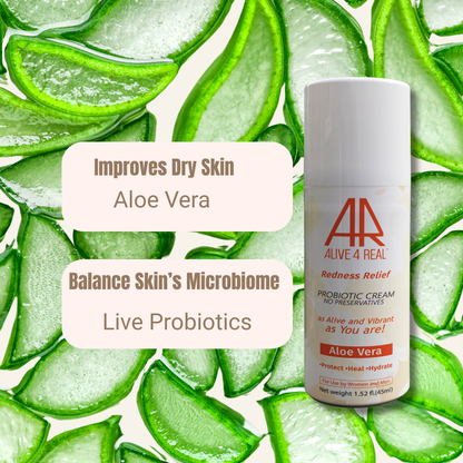 Probiotic cream bottle with aloe vera leaves on a light green background