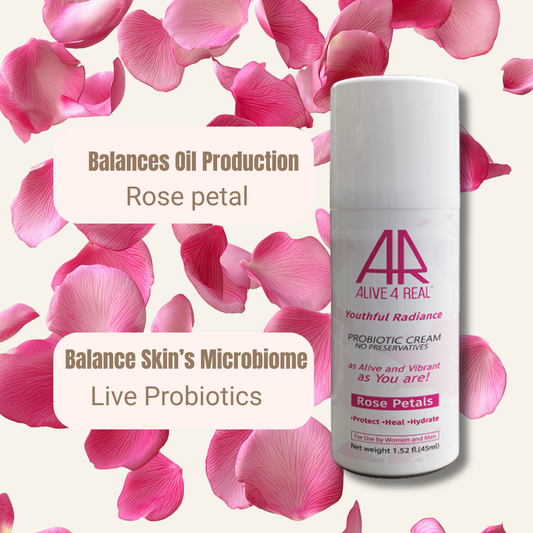 Skincare product with pink rose petals on a light background